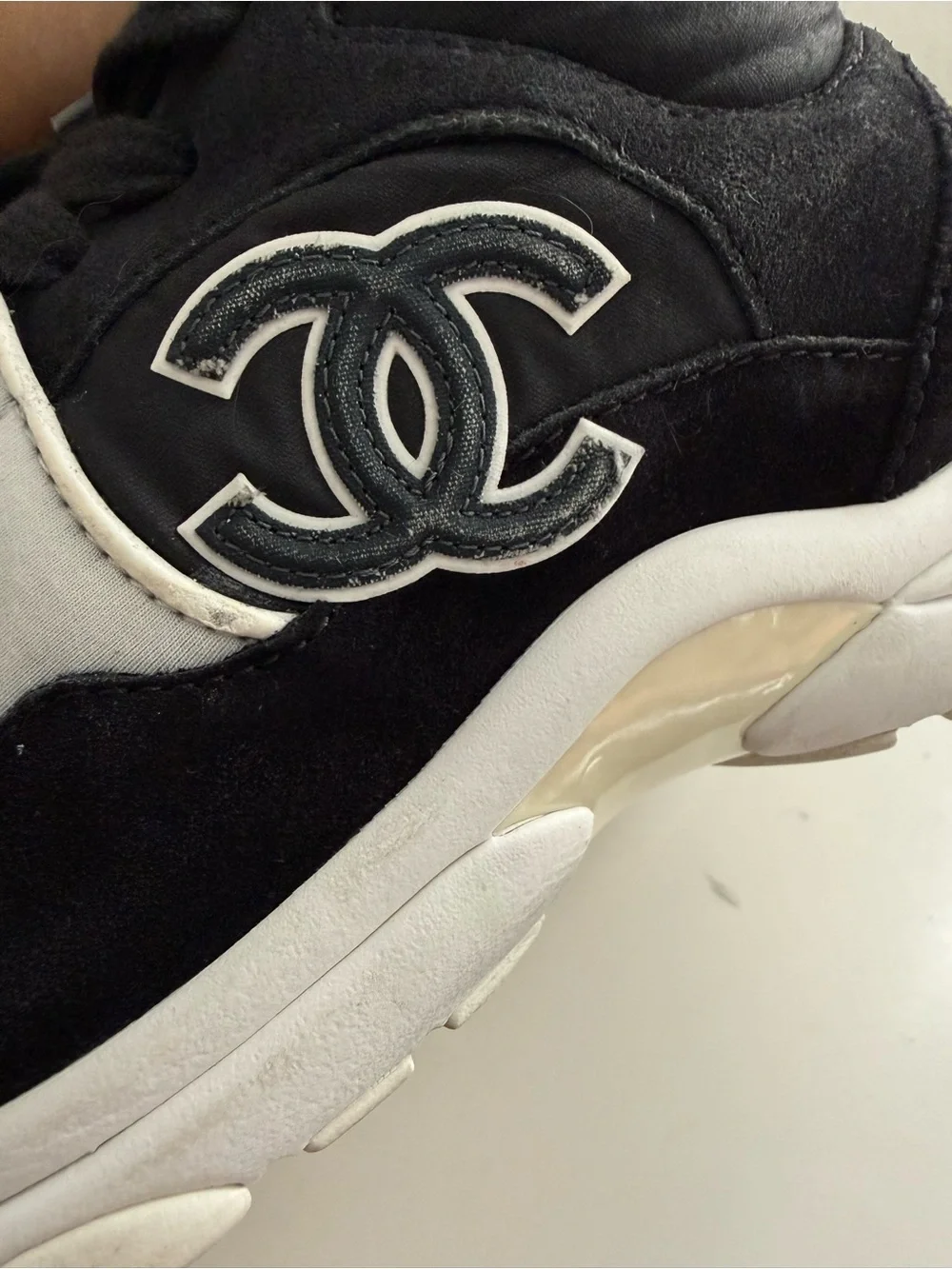 CHANEL Black and White Logo Sneakers